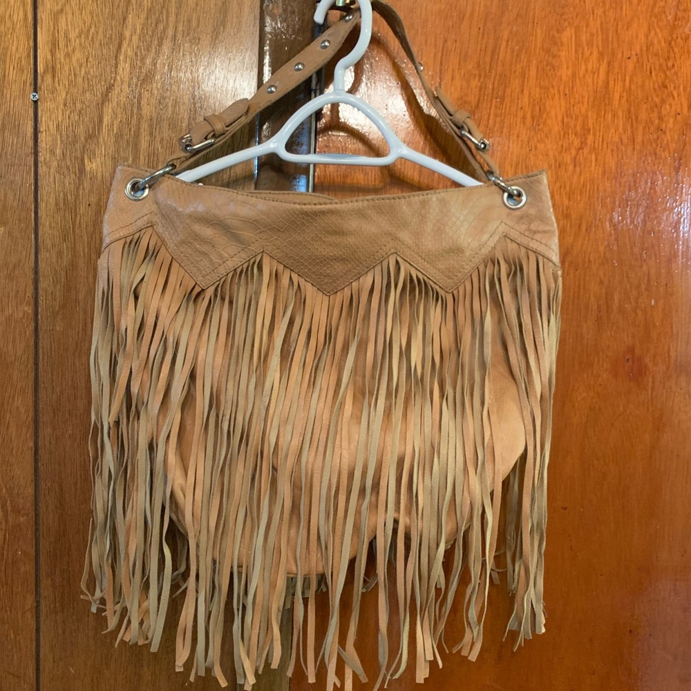 Camel colored fringe bag with silver accents
